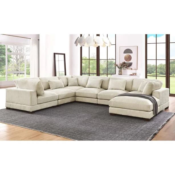 Arliz 7 Piece 144" Wide Reversible Modular Corner Sectional with Ottoman Wade Logan Fabric