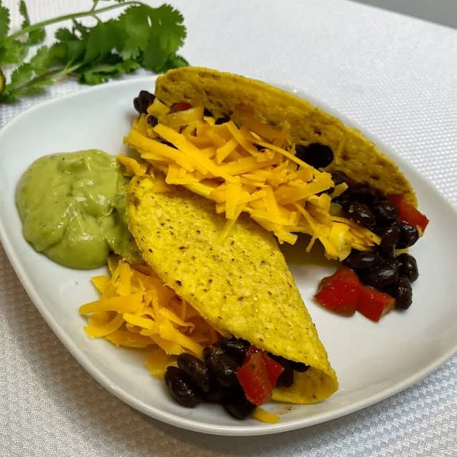 Crispy Black Bean Tacos with Avocado Lime Sauce