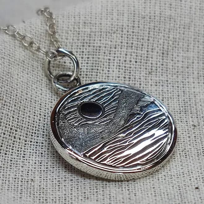 Hand Engraved Circular Pendant Glistening Waters
