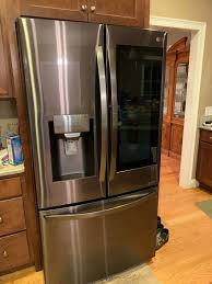 Shop LG French Door InstaView™ Door-in-Door® Refrigerator & Electric Range Suite in Fingerprint-Resistant Black Stainless Steel at Lowes.com