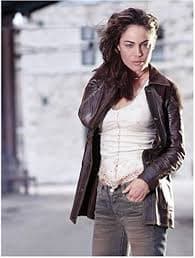 Witchblade (TV Series 2001 - 2002) 8 Inch x10 Inch Photo Yancy Butler Black Leather Jacket Over White Blouse & Jeans One Hand in Pocket kn at Amazon's Entertainment Collectibles Store