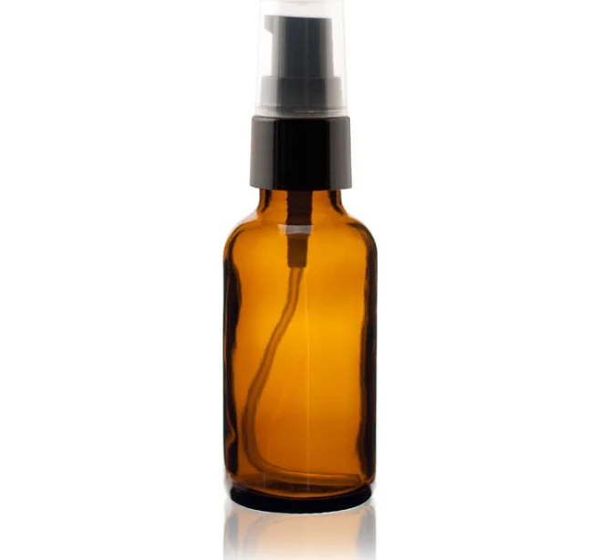 Specialty Bottle 1 oz Amber Boston Round Glass Bottle with Black Treatment Pump