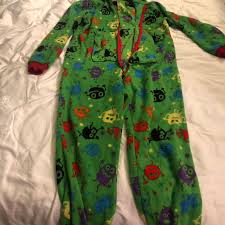 Alien print onesie Zip is broken and one pocket... | Depop