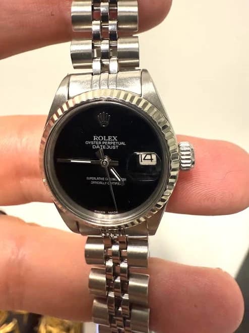 Rolex Ladies Datejust Black Dial Fluted Bezel Jubilee Band Watch