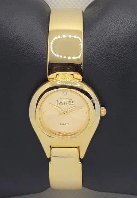 Ladies Classic Petite Round Gold Tone Case Link Bracelet Analog Watch