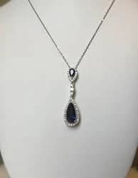 Sterling silver multi stone pear shaped blue sapphire halo pendant