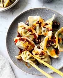*Dumplings in Chili Oil Sauce (红油抄手)