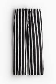 Wide pull-on trousers - Black/Striped - Ladies | H&M