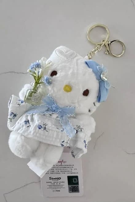 Sanrio Hello Kitty Plush Keychain With Blue Dress And Flower Accessory