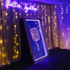 Experience the Magic Mirror Photo Booth!