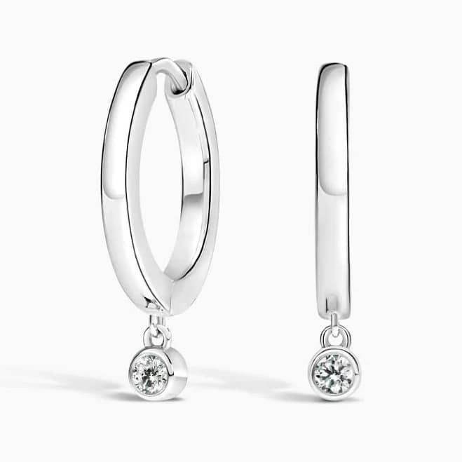 Diamond Drop Huggie Earrings in Silver