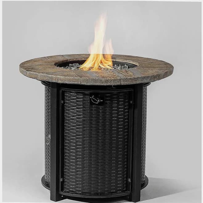 Circular propane pit table with lava rock Latitude Run