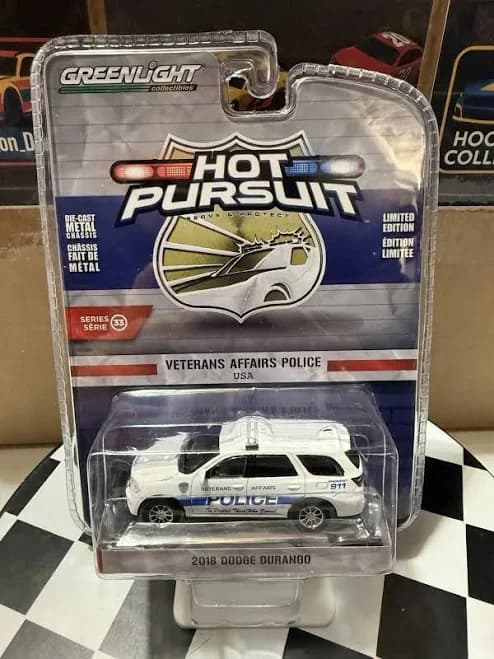 Hot Pursuit Veterans Affairs Police Dodge Durango 1/64 Diecast