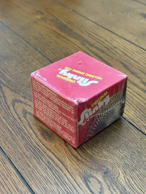 Buy Now - Original 1980s Metal Slinky Sealed In Original Box.
