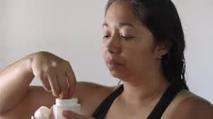 Woman Cleans Face with Cotton Pad in Bathroom, Medical Stock Footage ft. woman & skincare - Envato
