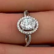 Art Deco Twist Sterling Silver Oval Halo Engagement Ring