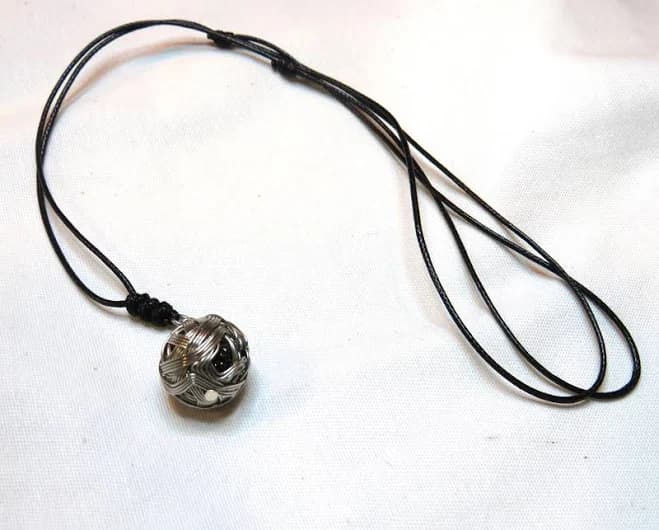 Cord and Round Silver Wire Charm