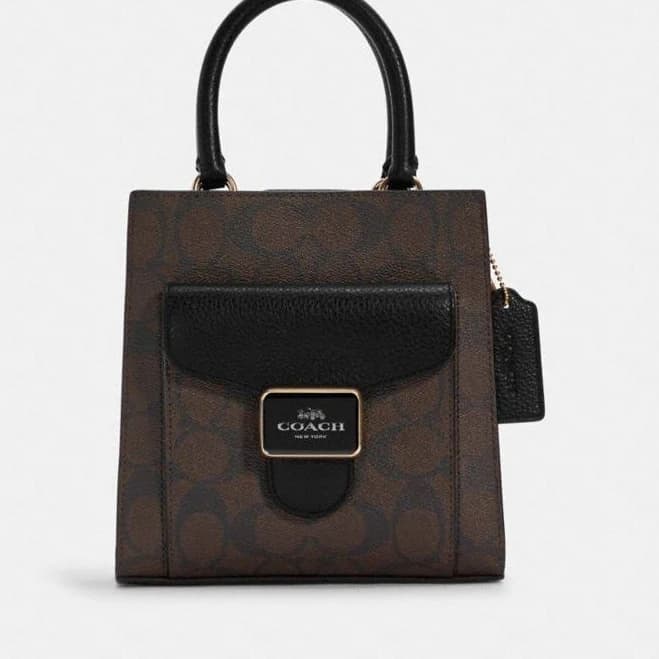 Coach Women's Mini Pepper Crossbody in Signature Canvas
