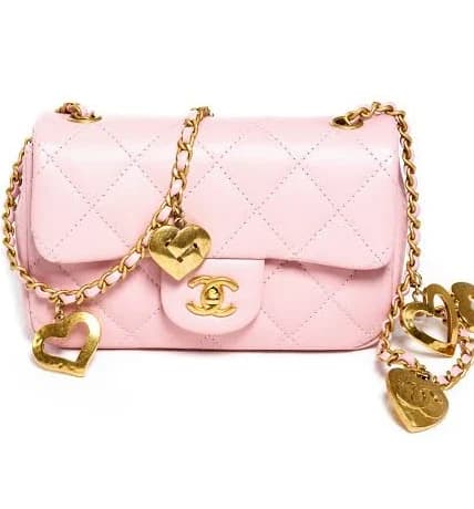 CHANEL Mini Quilted Heart Charms Flap Bag with Turn-Lock Closure