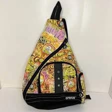 Crocs Sling Bag Backpack Graffiti Print Yellow Orange with crocs charm holders
