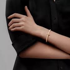 Tiffany T:T1 Wide Diamond Hinged Bangle in Yellow Gold | Tiffany & Co. US