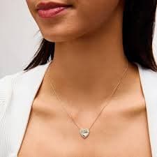 1/6 CT. T.W. Diamond Frame Sunray Heart Necklace in 10K Gold - 17" | Zales Outlet