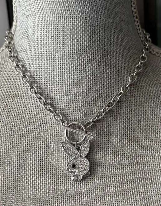 Silver-toned Playboy Bunny Pendant Necklace With A Toggle Clasp