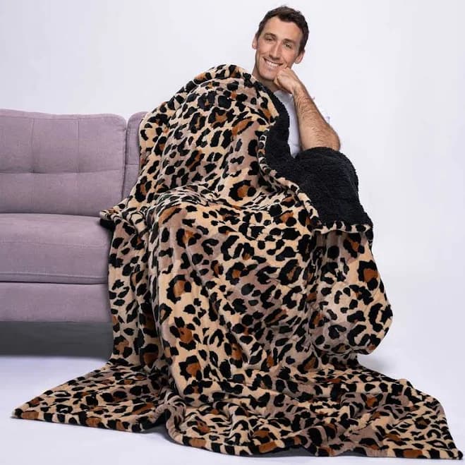 The Oodie Sherpa Fleece Throw Blanket —