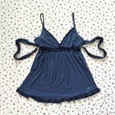 Hollister blue babydoll tank top with polka dot details and tie back ribbon