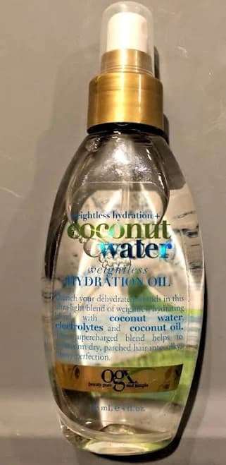 OGX Weightless Hydration Oil Coconut Water Hydration 4 oz spray bottle