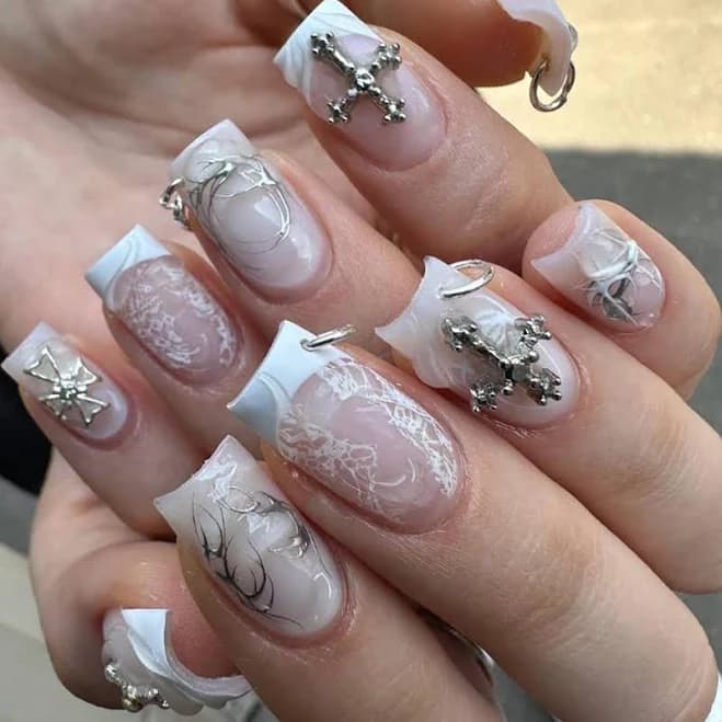 Handmade Gothic White Press On Nails | 3D Cross Charms, Lace Web Art & Silver Piercings On Milky French Tips | Nails For Edgy Gothic Vibe