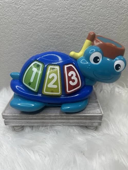 Baby Einstein Neptune’s Ocean Discovery Jumper Turtle Lights Sound