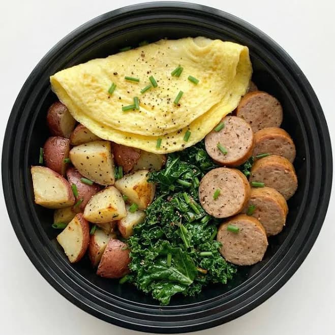Breakfast Power Bowl with Eggs, Red Potatoes, Sauteed Kale, Turkey Sausage