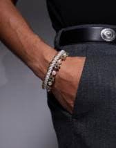 ASOS DESIGN 3 pack cord bracelet set with faux shell beads in multi color | ASOS