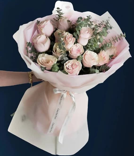 White roses and eucalyptus bouquet YVETTE Casa Dei Fiori Florist at Casa Dei Fiori