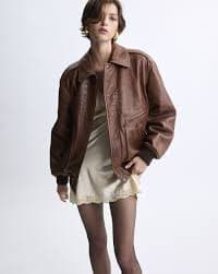 padded bomber jacket in vintage grained lambskin in Brown | Saint Laurent | YSL EN-NL