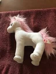 white and pink unicorn plush