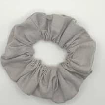 Mini 100% cotton hair scrunchie in solid light grey colour fabric.