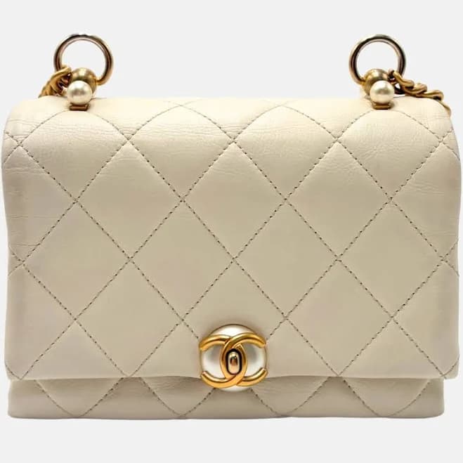 CHANEL Quilted Leather Crossbody Bag with Pearl Side Flap