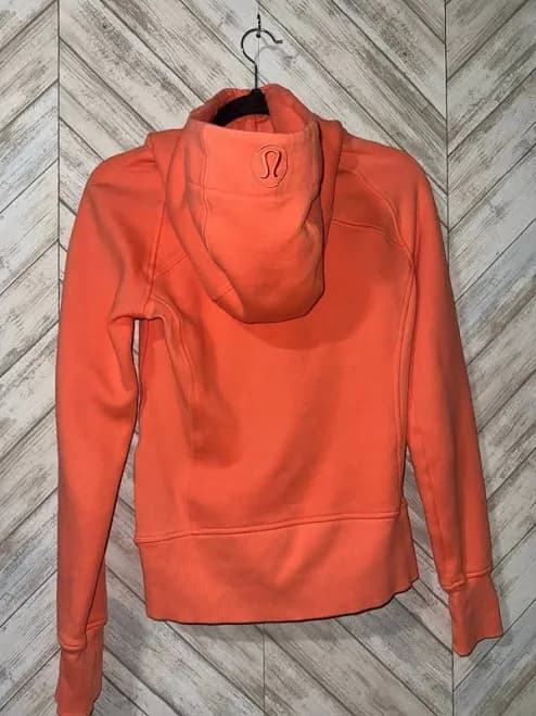 Lululemon Scuba Full-Zip Hoodie in the color Brick or Warm Coral.