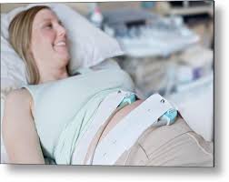 Pregnant Woman With Foetal Heart Rate Monitor Metal Print by Science Photo Library - Science Photo Gallery