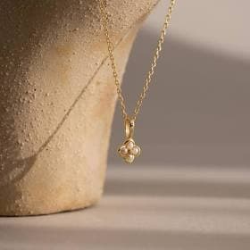 Caitlyn Minimalist 18K Gold Pearl Flower Charm Necklace