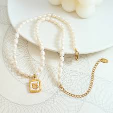 Exquisite Elegant High-Grade Fashion Fresh Water Pearl Chain Stainless Steel Gold Plated Butterfly Brand Pendant Necklace| Alibaba.com